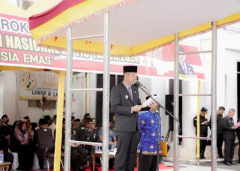 Jadi Inspektur Upacara Harkitnas, Bupati Rohil Sampaikan Amanat Menteri Kominfo RI