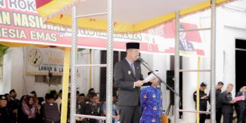 Jadi Inspektur Upacara Harkitnas, Bupati Rohil Sampaikan Amanat Menteri Kominfo RI