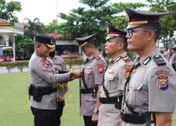 Kapolres Pelalawan Pimpin Upacara Pelantikan dan Serah Terima Jabatan Kapolsek